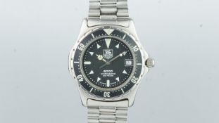 GENTLEMEN'S TAG HEUER 2000 REF. 973.006, black dial, date aperture, luminous hour markers,