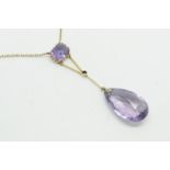 Amethyst drop pendant, on a yellow metal chain stamped 9ct, (one stone missing)