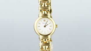 LADIES' BULOVA WRISTWATCH, white dial gold plated case and bracelet, quartz movement.