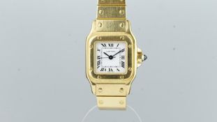 LADIES'' 18CT CARTIER SANTOS, white dial with Roman numerals, sapphire set crown, 18ct case and