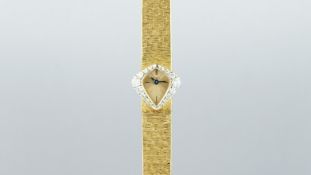 VINTAGE LADIES'' PIAGET, 18ct case and bracelet, diamond set bezel, bracelet style watch