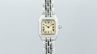 LADIES' CARTIER SANTOS REF. 1320, square beige dial with Roman numerals and gun metal blue hands,