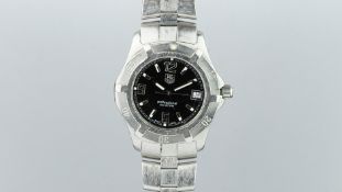 GENTLEMEN'S TAG HEUER PRFESSIONAL REF. WN1110, black dial, date aperture, 36mm stainless steel case,