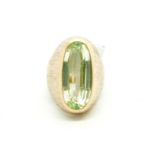 Single stone spinel ring, greenish blue spinel, set in a heavy yellow metal mount, bearing French