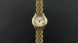 LADIES' CARTIER COUGAR 18K GOLD WRISTWATCH, circular off white dial with Roman numerals, a date