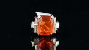 Fire opal and diamond ring, rectangular mixed cut fire opal measuring 13 x 10.5mm, with three