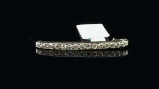 Tiffany & Co Art Deco diamond bar brooch, set with graduated old cut diamonds, weighing an estimated