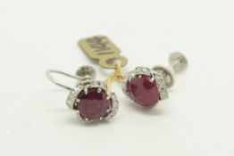 Ruby and diamond screw back ear clips, set in white metal
