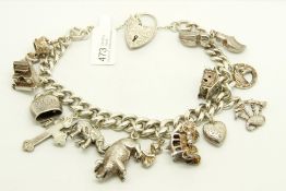 Silver charm bracelet, curb link chain with an engraved heart padlock clasp, with safety chain,
