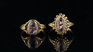 Two single stone amethyst rings, both mounted in yellow metal, one bearing French marks to the outer