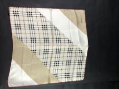 Burberry Sqaure Scarf, original print and label. Approximately 47x47