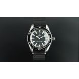 GENTLEMEN'S OMEGA SEAMASTER 300 WRISWATCH, circular black with luminous green hour markers and an