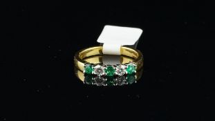 Five stone emerald and diamond half eternity ring, three round cut emeralds and two round