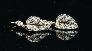 Pair of rose cut diamond set leaf earrings, on a French wire fitting