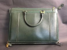 Vintage Bally Breif case, Green leather exterior, brass hard ware, three main compartments, the