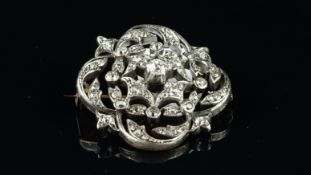 Victorian floral old cut diamond brooch, set with approximately 1.50ct of old cut diamonds,