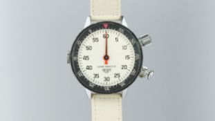 HEUER 'GAME-MASTER' STOPWATCH, circular white dial with Arabic numerals and inner black bezel,