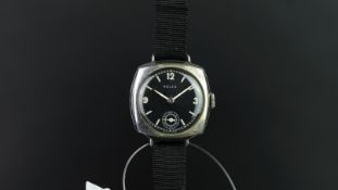 VINTAGE ROLEX TRENCH WATCH, circular black dial with white Arabic numerals and hour markers, a