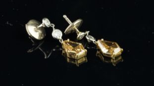 Diamond drop earrings, fancy yellow mixed cut diamond measuring an estimated 8.4 x 5.8 x 2.22mm,