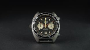 GENTLEMEN'S HEUER AUTAVIA CHRONOGRAPH, circular black dial with baton hour markers and twin
