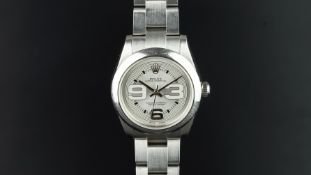 LADIES' ROLEX OYSTER PERPETUAL W/ BOX AND PAPERS REF. 177200, circular silver two tone dial with