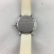Chopard Happy Sport Snow Flake, circular white dial with snow flake design, luminous hour markers