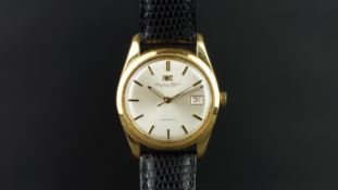 GENTLEMEN'S IWC 18K GOLD WIRSTWATCH, circular silver dial with gold baton hour markers, a date