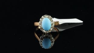 Turquoise and diamond ring, oval cabochon cut turquoise surrounded by rose cut diamond, mounted in