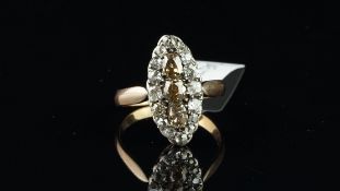 French marquise shaped old cut diamond panel ring, set with three fancy yellowish brown diamonds,