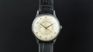 GENTLEMEN'S JAEGER LE COULTRE DATE CHANGE WRISTWATCH, circular aged dial with Arabic numerals and an