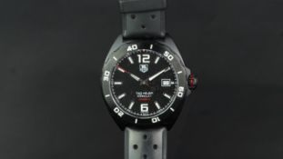 GENTLEMENâ€™S TAG HEUER FORMULA 1 AUTOMATIC, black dial with luminous hour makes, date aperture,