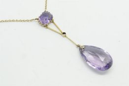 Amethyst drop pendant, on a yellow metal chain stamped 9ct, (one stone missing)