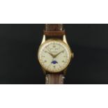 VINTAGE MINIMAX TRIPLE CALENDAR WRISTWATCH, circular dial with luminous Arabic numerals, day and