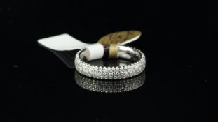 Diamond eternity ring, pave set round brilliant cut diamonds, weighing a total of 1.00ct, set in