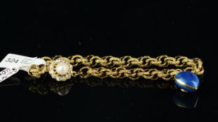 A gold, Prince of Wales, chain bracelet, with granulated links, with a natural pearl and old-cut