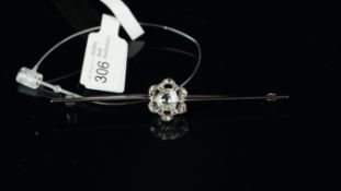 Diamond bar brooch, old cut diamond measuring approximately 6.13 x 5.60 x 2.61mm within a floral