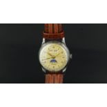 VINTAGE ZODIAC TRIPLE CALENDAR WRISTWATCH, circular dial with Arabic numerals, day and date