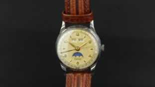 VINTAGE ZODIAC TRIPLE CALENDAR WRISTWATCH, circular dial with Arabic numerals, day and date