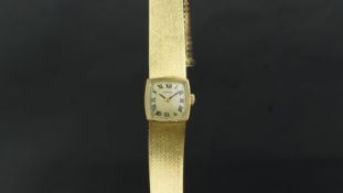 Ladies'' vintage Cartier wristwatch, cushion silvered dial with Roman numerals, on an integrated