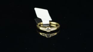 Seven stone diamond ring, estimated total diamond weight 0.25ct, set in 18ct gold, ring size J1/2