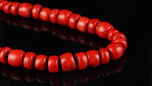 Coral bead necklace, red barrel shaped coral beads measuring approximately 4.6 x 13-15.5 x 18.2mm,