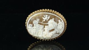 A vintage carved shell cameo brooch, depicting Aurora, Goddess of the dawn, mounted in 9ct yellow