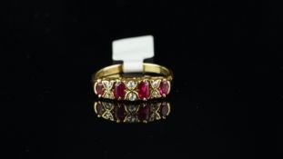 Ruby and diamond carved half hoop, four oval cut rubies, separated by old cut diamonds, mounted in