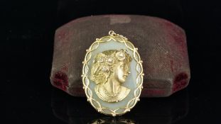 Vintage chalcedony, diamond and gold cameo, designed as an oval chalcedony plaque, with a gold