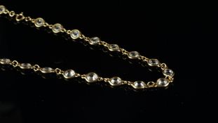 Goshenite necklace, oval, old cut white beryl, rubover set, with chain link connection, mounted in