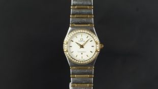 LADIES' OMEGA CONSTELLATION DIAMOND BEZEL WRISTWATCH, circular white dial with gold baton hour