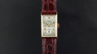 RARE GENTLEMEN'S PATEK PHILIPPE 18K GOLD WRISTWATCH REF. 507209, rectangular silver dial with gold