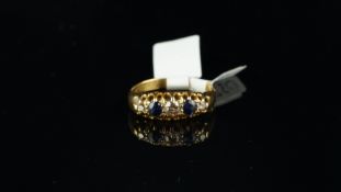 Carved half hoop sapphire and diamond five stone ring, mounted in 18ct yellow gold, ring size R