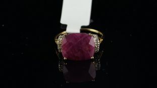 Ruby and diamond ring, cushion shaped opaque ruby, with diamond detail to the shoulders, mounted