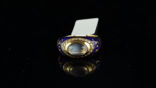 Faberge moonstone diamond and enamel ring, central oval cabochon cut moonstone, surrounded by